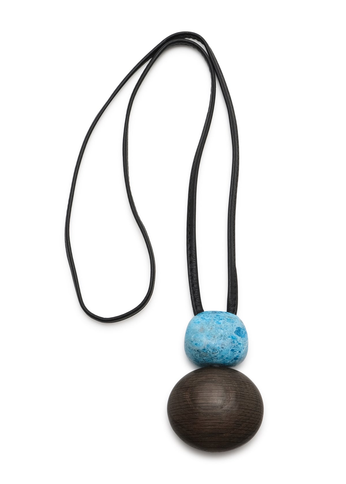 blue apatite gemstone and bog oak pendant